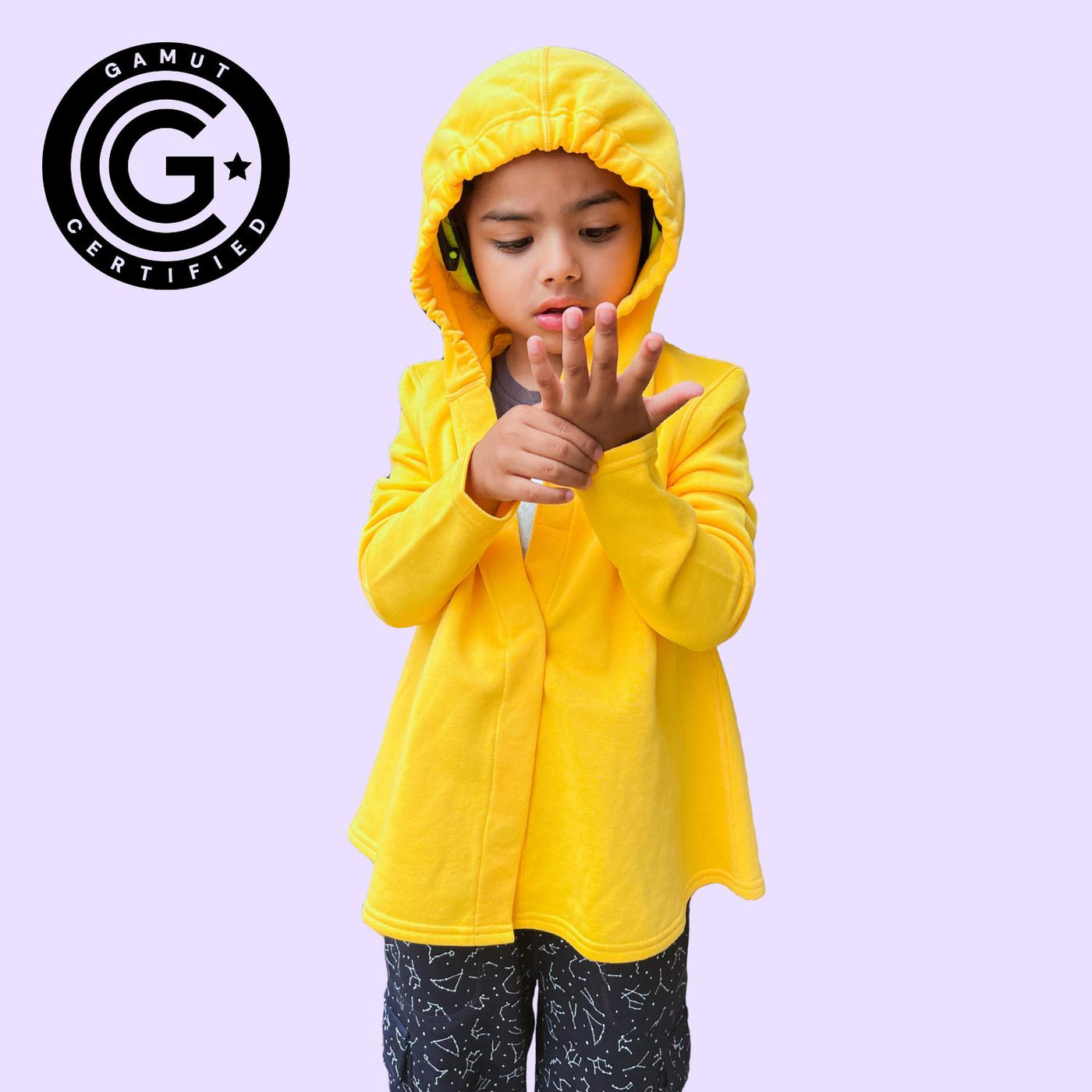 Sensory friendly hoodie with hood that fits headphones, magnetic closures, and no tags. GAMUT Seal of Approval™ in the top left corner.