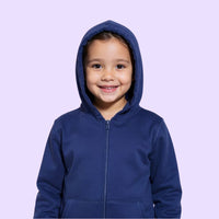 Child wearing a blue sensory hoodie against a light purple background