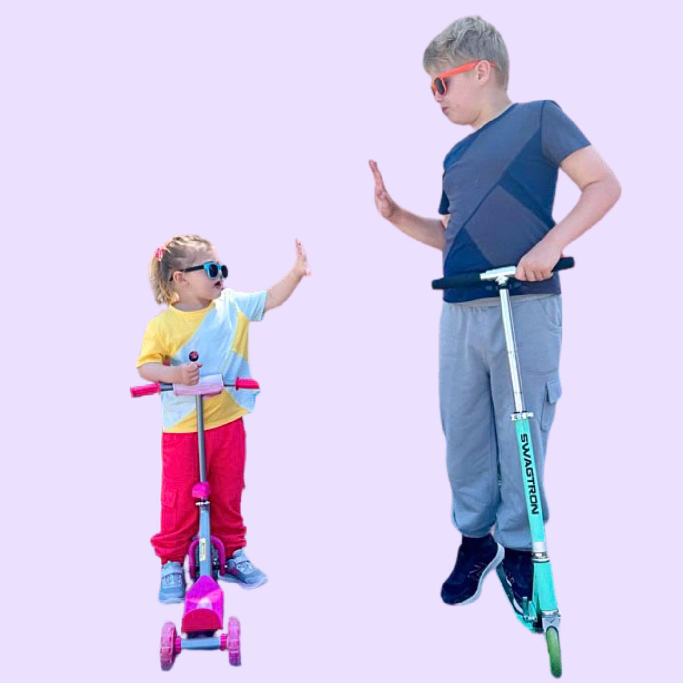 Two children with scooters in sensory t-shirts and joggers