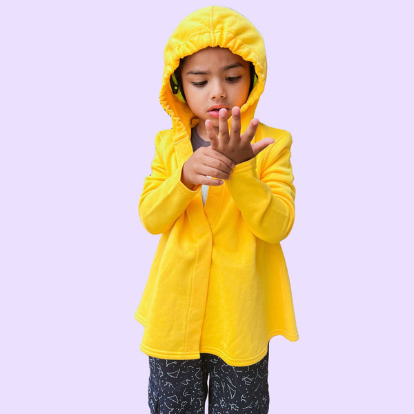 Sensory friendly hoodie with magnetic closures and a hood that fits headphones