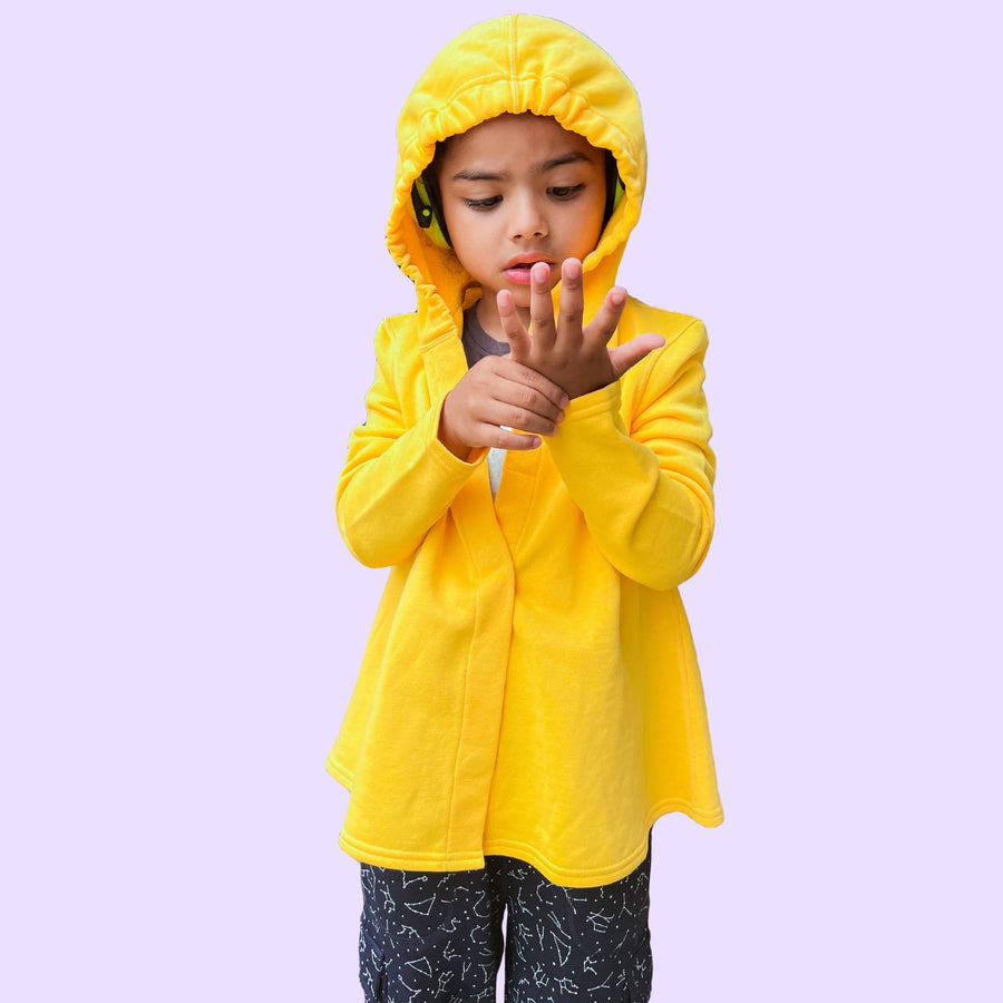 Sensory friendly hoodie with hood that fits headphones, magnetic closures, and no tags. 