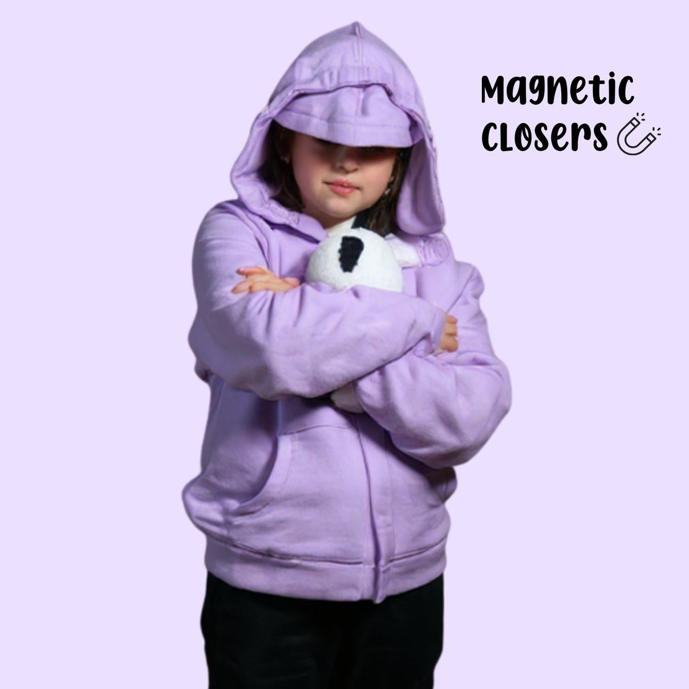 Sensory hoodie on a girl with the hood up and eye mask covering her eyes. Holding a stuffed panda in her arms.