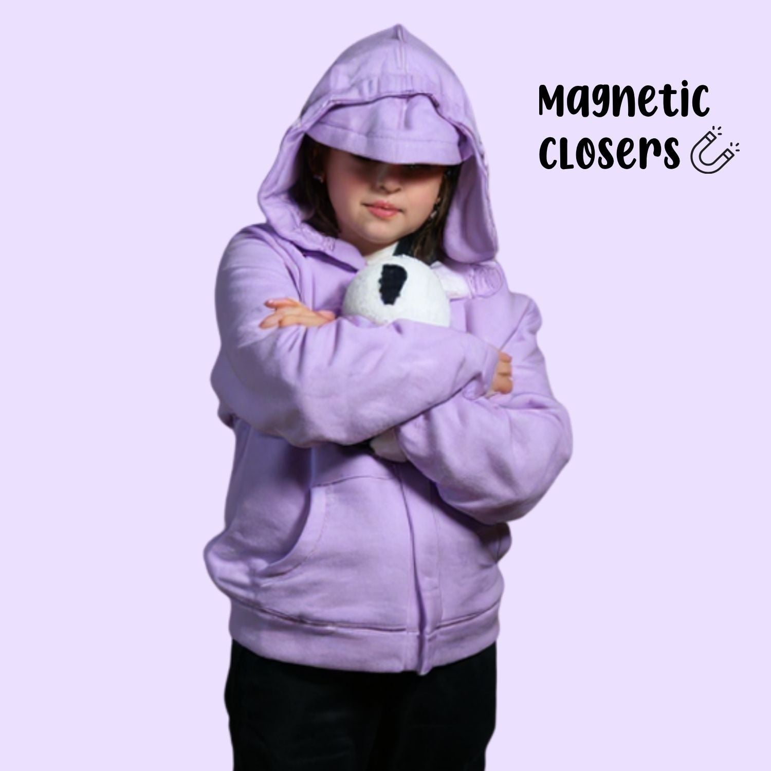 Sensory hoodie on a girl with the hood up and eye mask covering her eyes. Holding a stuffed panda in her arms.