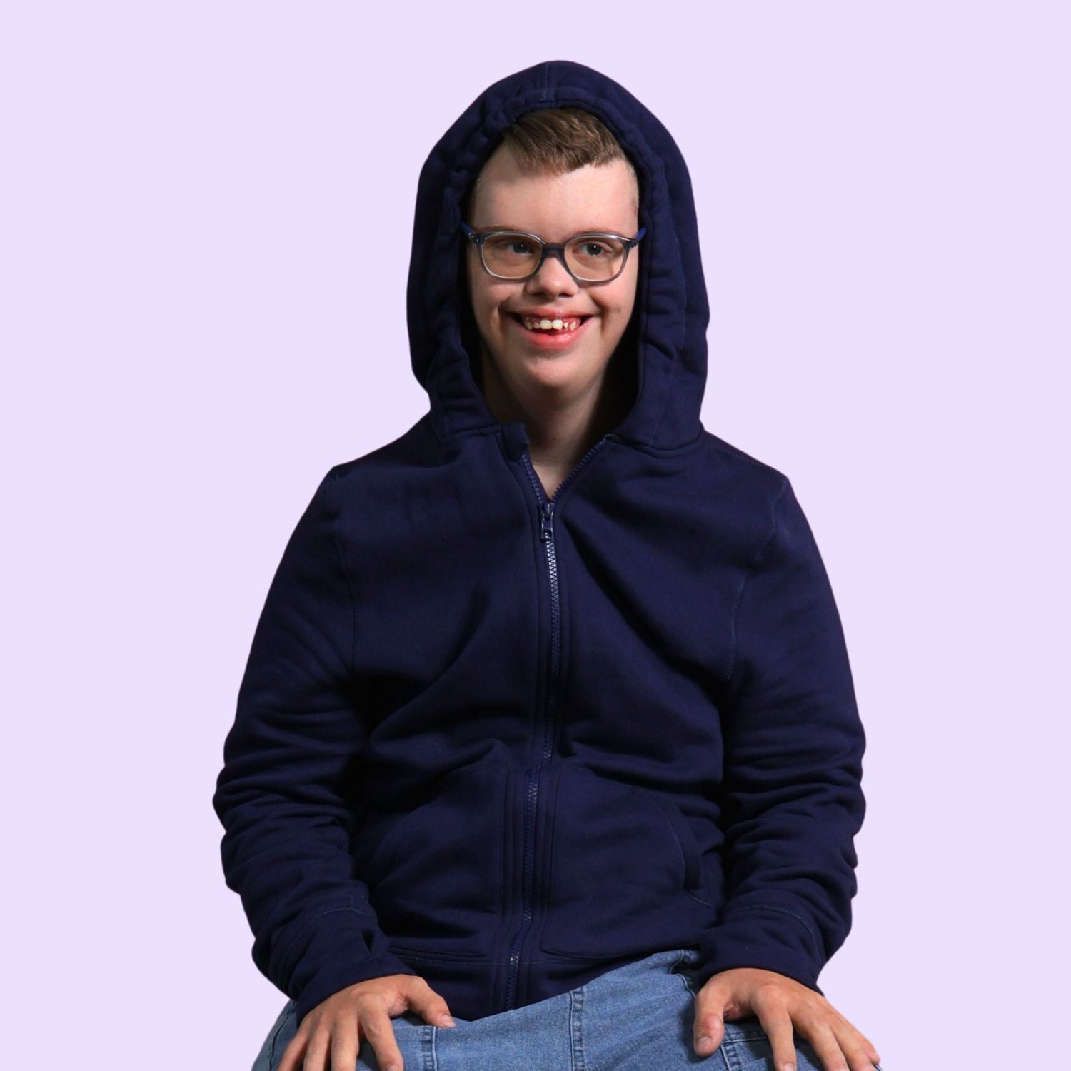 Man with disabilities wearing a sensory hoodie with sound reducing hood pulled up