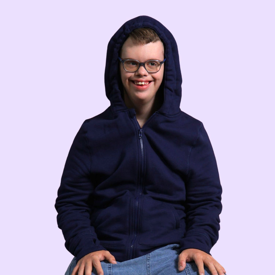 Man with disabilities wearing a sensory hoodie with sound reducing hood pulled up